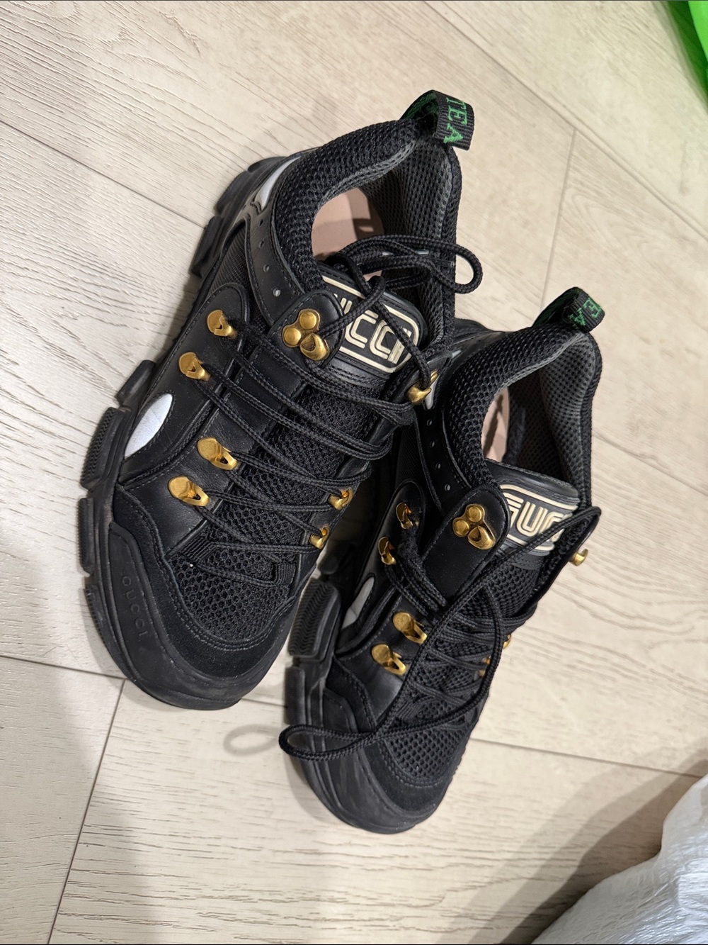 Gucci Black Sneakers with Gold Hardware